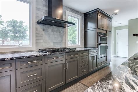 grey cabinets black stainless steel appliances|grey kitchen with black cabinets.